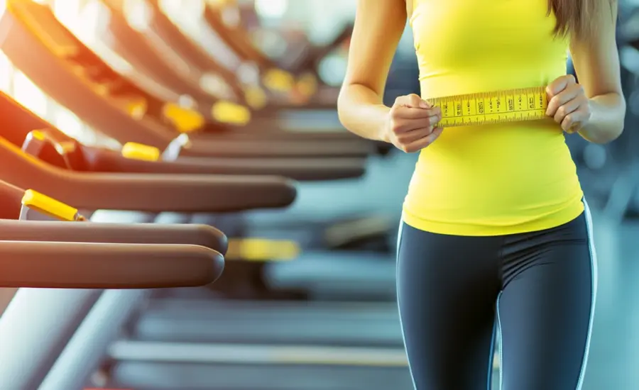 Women on Treadmill with tape measure